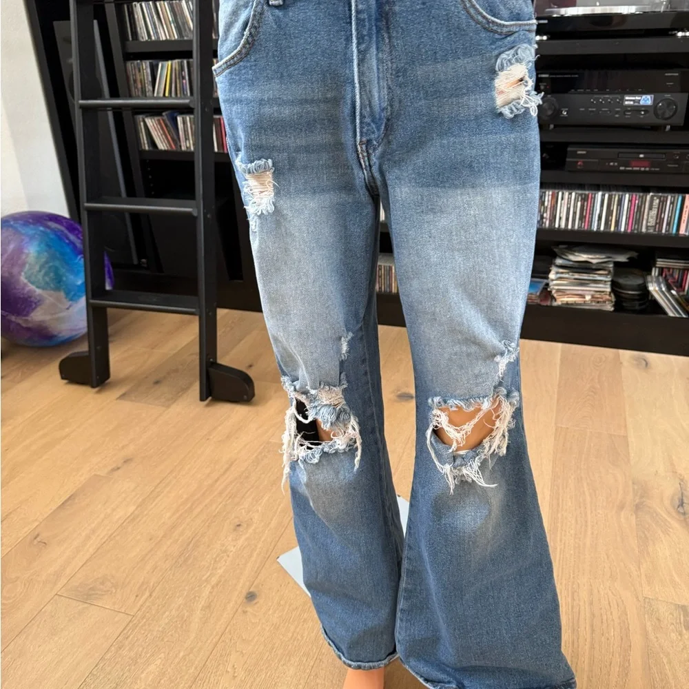 Almost Famous women's Light Blue Distressed flared Jeans